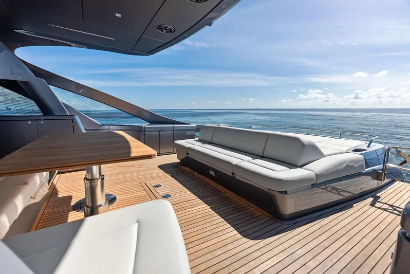 Barnext Yacht Photos Pics Luxurious 2025 Pershing 7X yacht deck with elegant seating and ocean view.