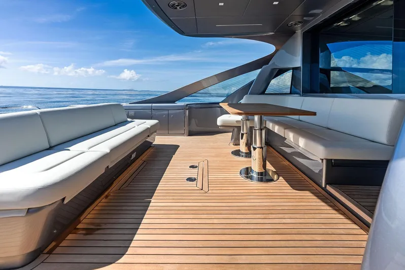 Barnext Yacht Photos Pics Luxurious 2025 Pershing 7X yacht deck with sleek seating and ocean view.