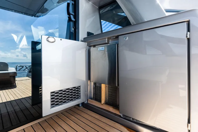 Barnext Yacht Photos Pics Luxury Pershing 7X yacht interior, featuring sleek cabinetry and modern design, 2025 model.