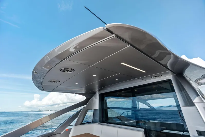 Barnext Yacht Photos Pics 2025 Pershing 7X yacht with sleek design and modern features, cruising on a clear blue sea.