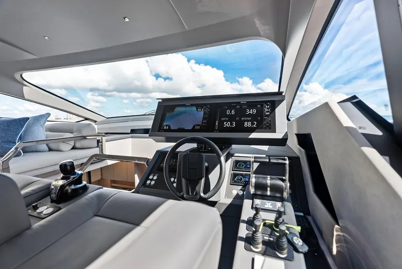 Barnext Yacht Photos Pics Interior cockpit of 2025 Pershing 7X yacht with modern controls and panoramic view.