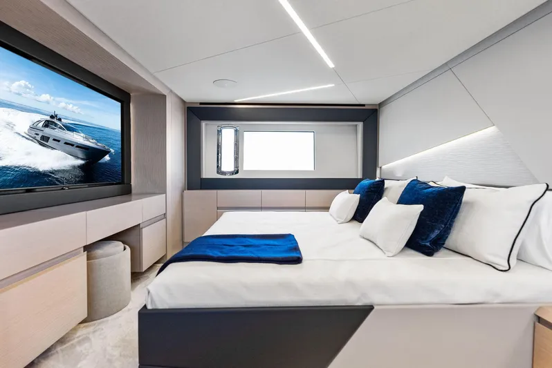 Barnext Yacht Photos Pics Luxurious bedroom interior of 2025 Pershing 7X yacht with modern design and ocean view.