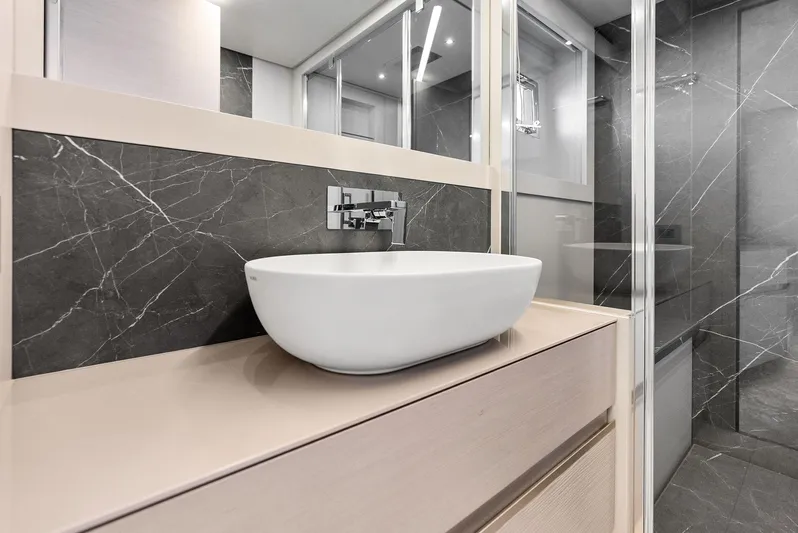 Barnext Yacht Photos Pics Modern bathroom sink with sleek design in Pershing 7X yacht, 2025 model.