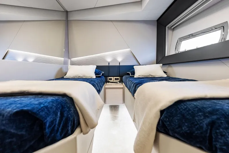 Barnext Yacht Photos Pics Luxurious twin cabin interior of 2025 Pershing 7X yacht with modern design.