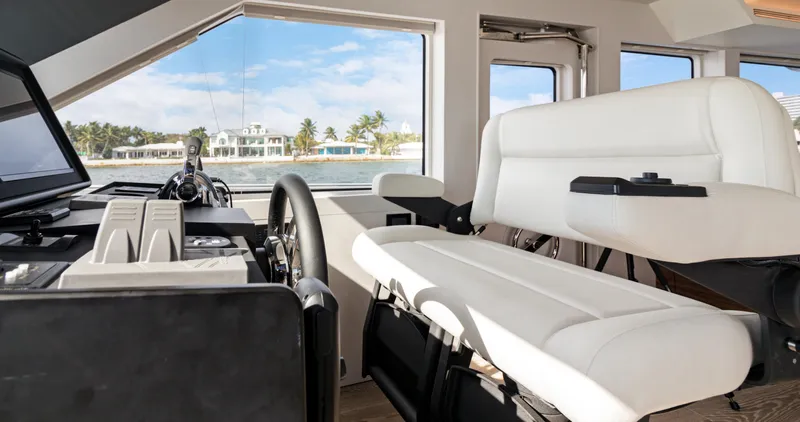 Clb65 Yacht Photos Pics Interior of 2024 CL Yachts CLB65, featuring modern helm and white seating.