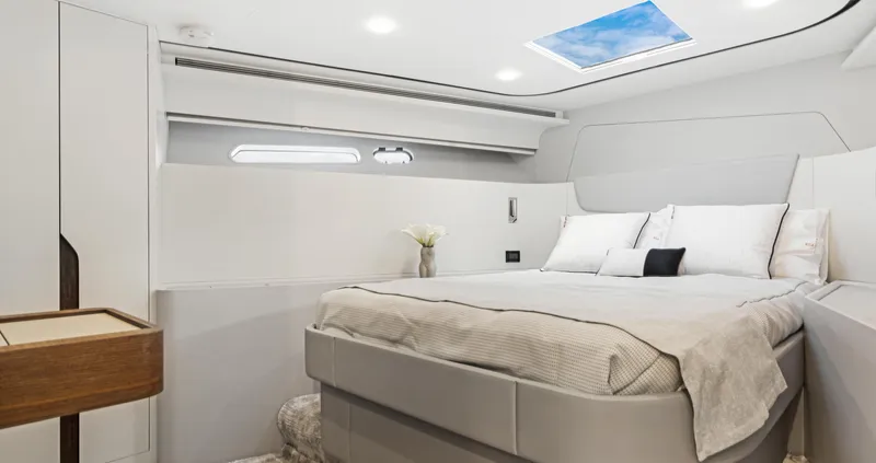 Clb65 Yacht Photos Pics Luxurious bedroom interior of 2024 CL Yachts CLB65 with modern design and skylight.