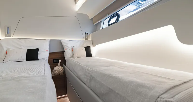 Clb65 Yacht Photos Pics 2024 CL Yachts CLB65 cabin with twin beds and modern interior design.