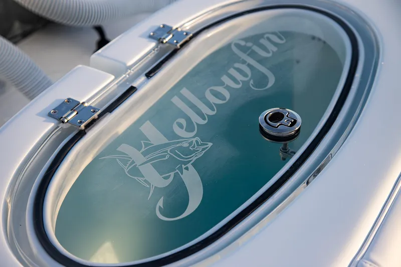 New Stock Yacht Photos Pics 2026 Yellowfin 36 Offshore boat livewell with logo and secure latch.