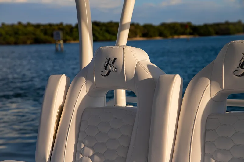 New Stock Yacht Photos Pics Luxury seating on 2026 Yellowfin 36 Offshore boat with scenic water backdrop.