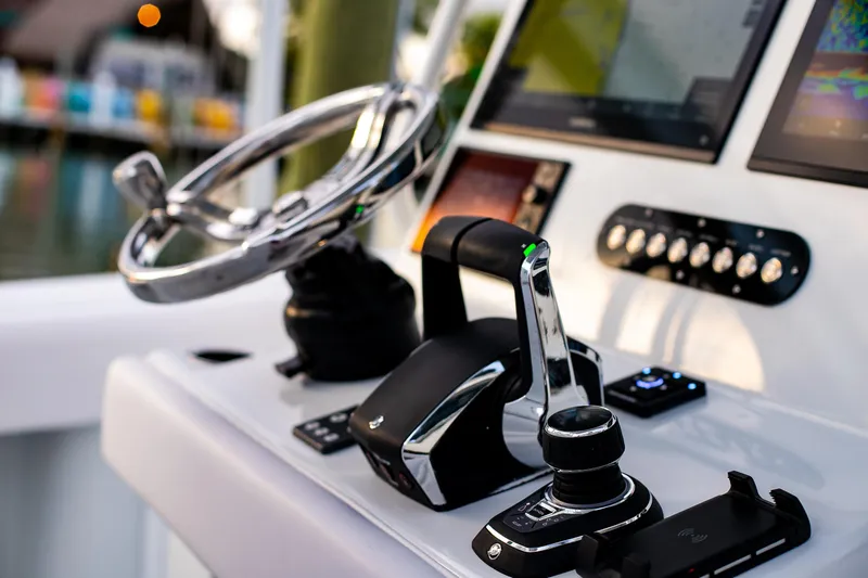 New Stock Yacht Photos Pics 2026 Yellowfin 36 Offshore boat helm with advanced controls and navigation displays.