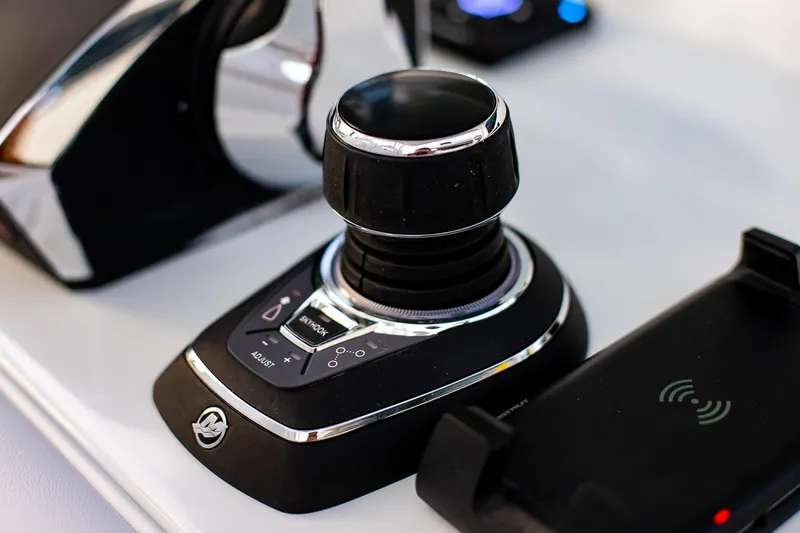 New Stock Yacht Photos Pics Joystick control on 2026 Yellowfin 36 Offshore boat dashboard.