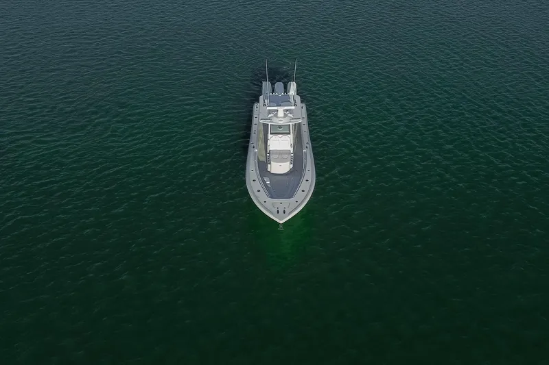 New Stock Yacht Photos Pics Aerial view of 2026 Yellowfin 36 Offshore boat on calm water.