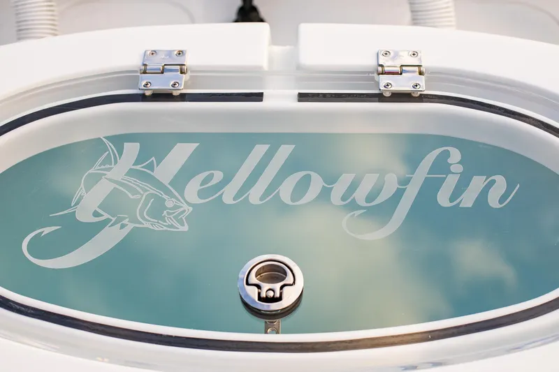 New Stock Yacht Photos Pics 2026 Yellowfin 36 Offshore boat logo on a sleek, modern surface.