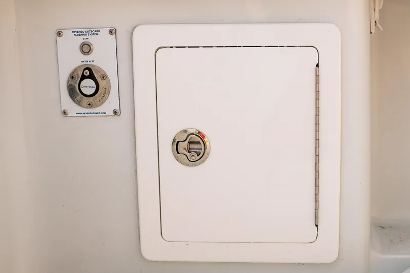 New Stock Yacht Photos Pics 2026 Yellowfin 36 Offshore boat compartment with Reverso outboard flushing system.