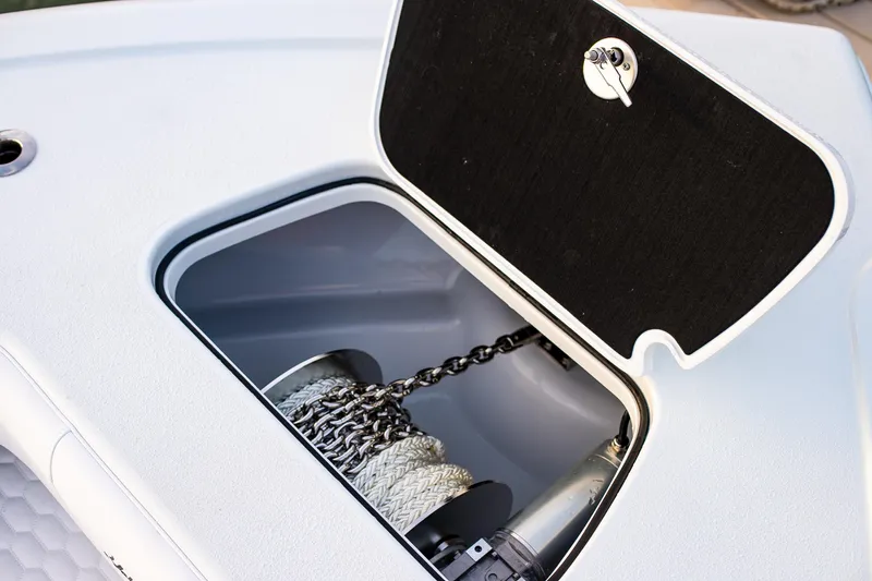 New Stock Yacht Photos Pics 2026 Yellowfin 36 Offshore boat anchor storage compartment with chain and rope.