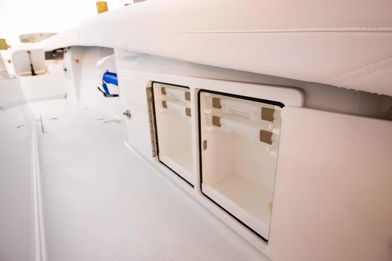 New Stock Yacht Photos Pics 2026 Yellowfin 36 Offshore boat interior storage compartments.