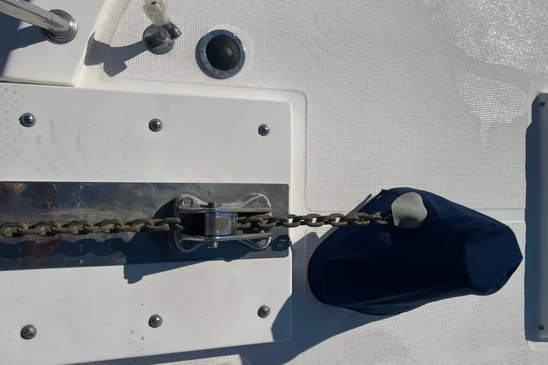  Yacht Photos Pics Anchor chain mechanism on 1997 McKinna 48 Pilothouse yacht deck.