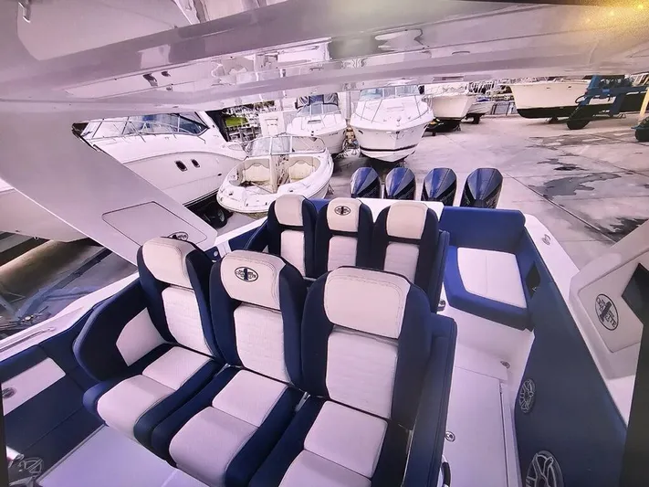  Yacht Photos Pics 2022 Cigarette 41 Nighthawk boat interior with luxurious seating and multiple engines.