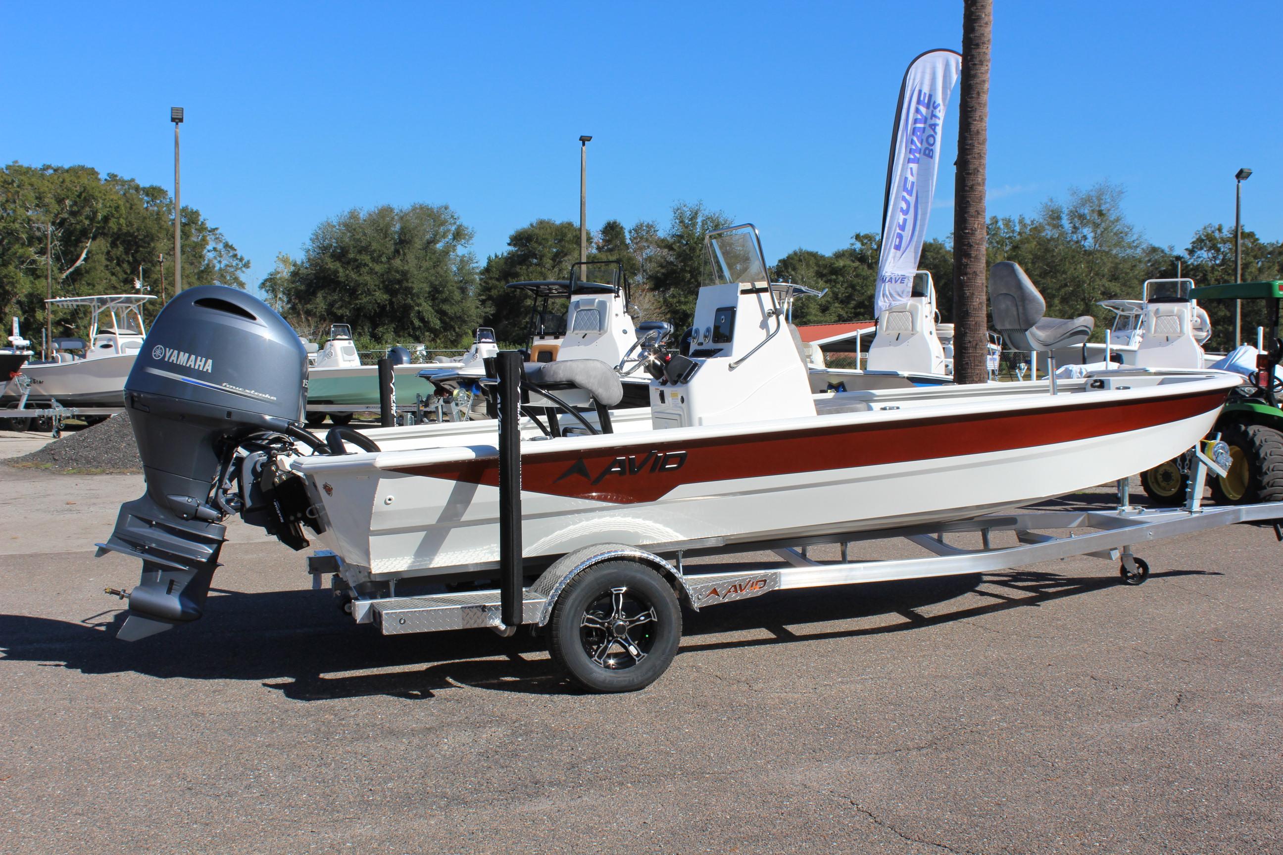 2023 Avid 21 Mag boat on trailer with Yamaha outboard motor.