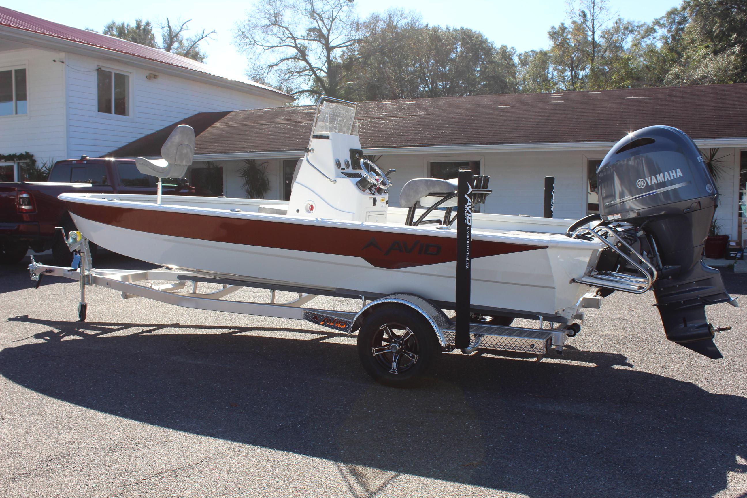 2023 Avid 21 Mag boat on trailer with Yamaha outboard motor.