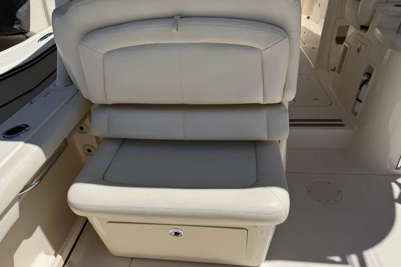335-714 Used Yacht Photos Pics 2021 Grady-White Freedom 335 boat seat with storage compartment.