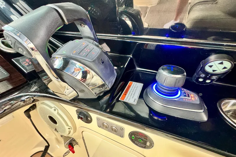  Yacht Photos Pics Control panel of 2021 Chris-Craft Calypso 35 boat with joystick and throttle.