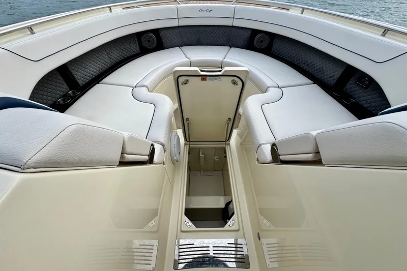  Yacht Photos Pics 2021 Chris-Craft Calypso 35 boat interior with luxurious seating and storage compartment.
