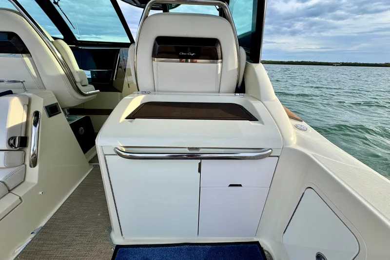  Yacht Photos Pics 2021 Chris-Craft Calypso 35 interior with luxurious seating and sleek design on open water.