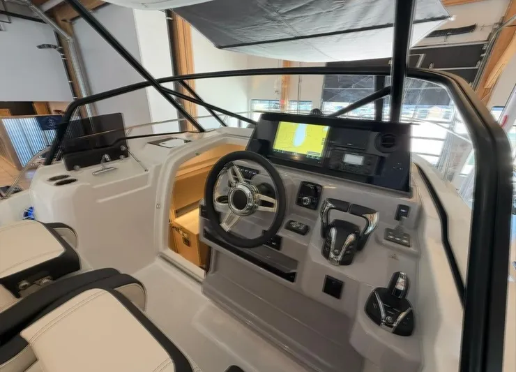  Yacht Photos Pics 2025 Jeanneau Leader 9.0 WA cockpit with modern navigation and control systems.