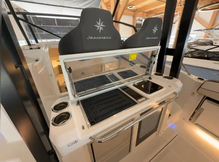  Yacht Photos Pics 2025 Jeanneau Leader 9.0 WA boat interior with modern kitchen amenities.