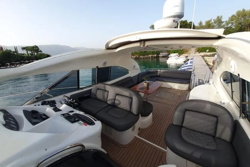  Yacht Photos Pics Luxury Sunseeker Predator 56 yacht interior, 2000 model, with elegant seating and helm.