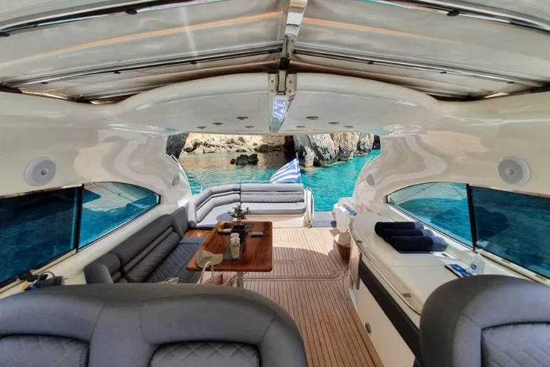  Yacht Photos Pics Luxurious Sunseeker Predator 56 yacht interior, 2000 model, with scenic ocean view.