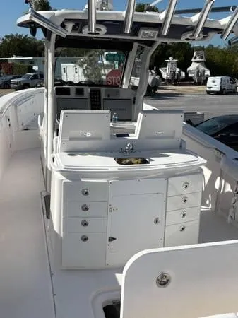  Yacht Photos Pics 2012 Everglades 325 Center Console boat with spacious deck and modern amenities.