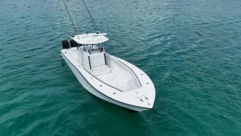  Yacht Photos Pics 2017 Yellowfin 36 Offshore boat on clear blue water.