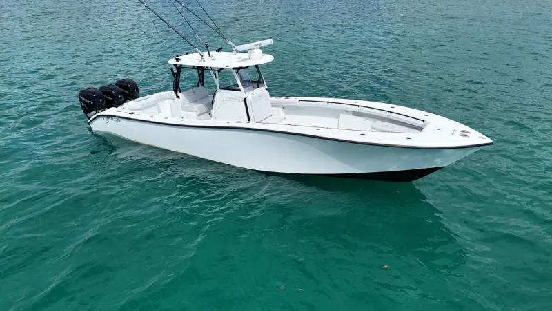  Yacht Photos Pics 2017 Yellowfin 36 Offshore boat on clear blue water.