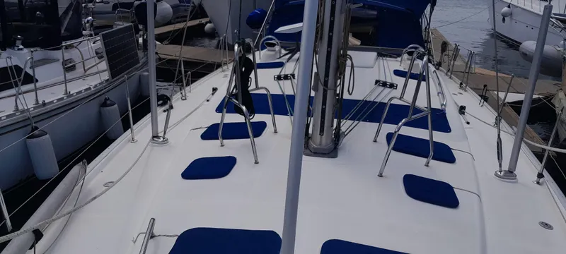 Picaro Yacht Photos Pics Deck view of a 2005 Beneteau Oceanis 473 sailboat docked at a marina.