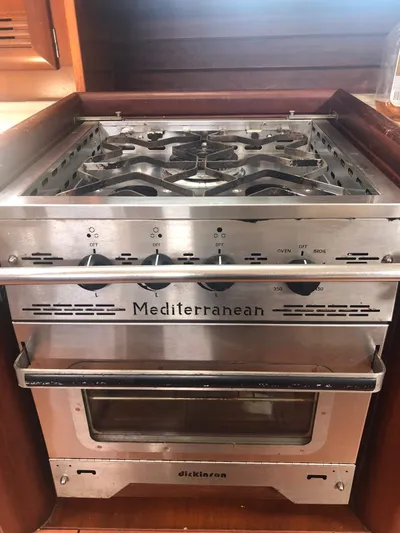 Picaro Yacht Photos Pics Stainless steel Mediterranean stove and oven on a 2005 Beneteau Oceanis 473 yacht.