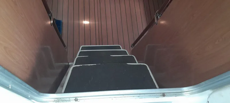 Picaro Yacht Photos Pics Staircase leading below deck on 2005 Beneteau Oceanis 473 sailboat.