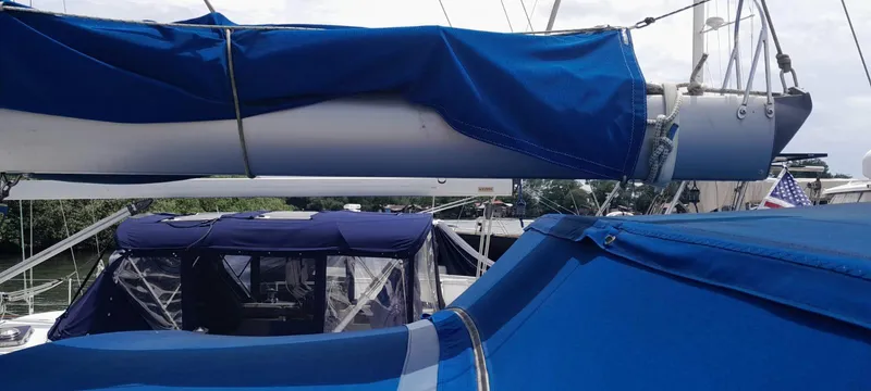 Picaro Yacht Photos Pics Beneteau Oceanis 473 sailboat, 2005 model, with blue covers and rigging details.