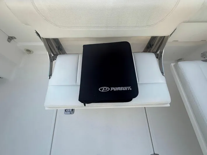  Yacht Photos Pics 2020 Pursuit DC 266 Dual Console boat seat with branded cover.