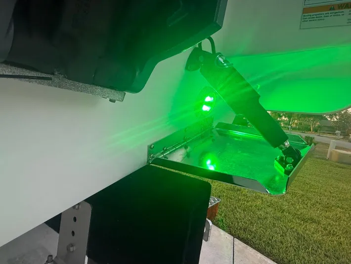  Yacht Photos Pics 2020 Pursuit DC 266 Dual Console boat with green underwater LED lights.