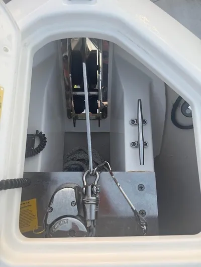 Yacht Photos Pics 2020 Pursuit DC 266 Dual Console anchor locker with winch and chain.