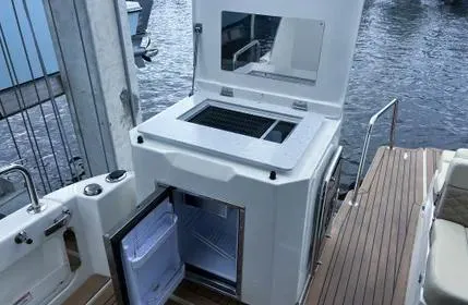  Yacht Photos Pics Aquila 36 Sport 2023 yacht with open fridge and grill on deck.