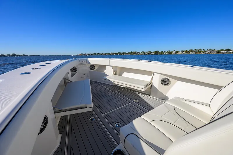Barefoot In Public Yacht Photos Pics 2023 SeaVee 370Z boat interior with luxurious seating and ocean view.