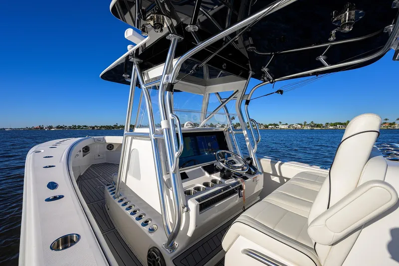 Barefoot In Public Yacht Photos Pics 2023 SeaVee 370Z boat interior with sleek design and advanced navigation system.