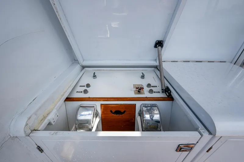 Able Hand Yacht Photos Pics 1978 Graves 51 boat control panel with dual levers and wooden accents.