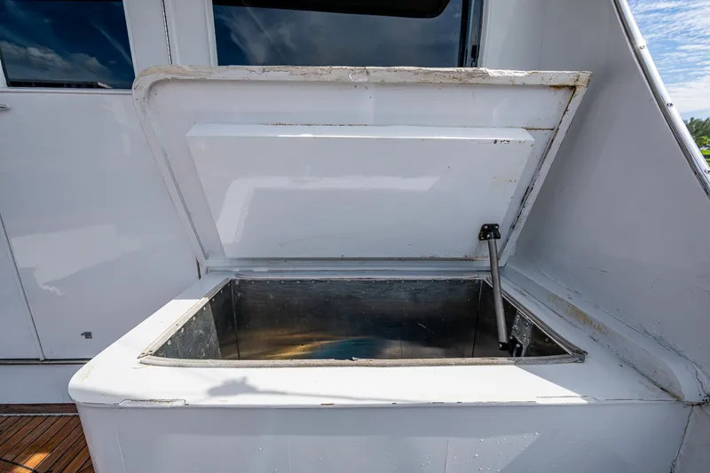 Able Hand Yacht Photos Pics Open storage compartment on 1978 Graves 51 boat deck.