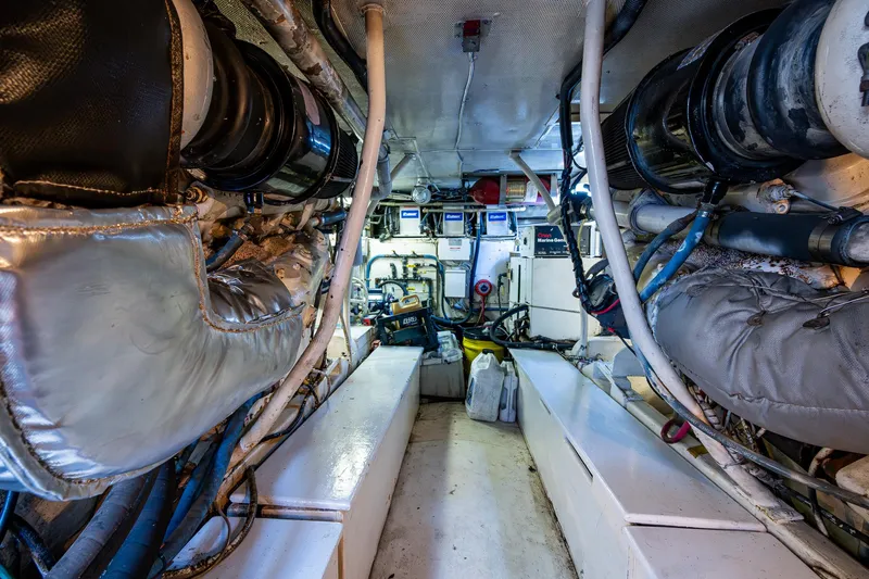 Able Hand Yacht Photos Pics Engine room of a 1978 Graves 51 boat, showcasing machinery and equipment.