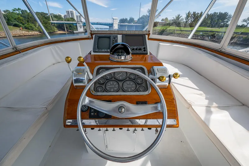Able Hand Yacht Photos Pics 1978 Graves 51 yacht helm with classic wooden dashboard and steering wheel.