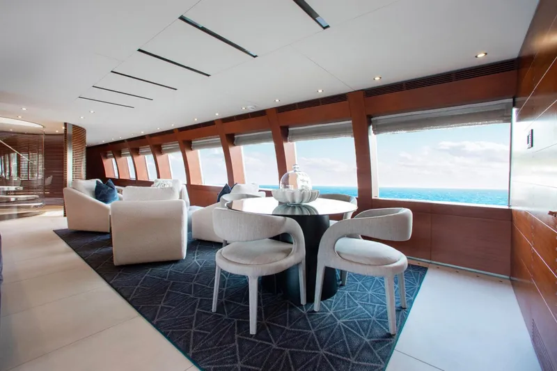 Matrix Yacht Photos Pics Luxurious interior of 1999 Baglietto 41M yacht with ocean view and elegant seating area.
